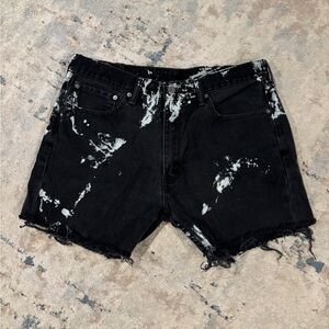 Denim black shorts frayed bottoms bleached marbling pattern